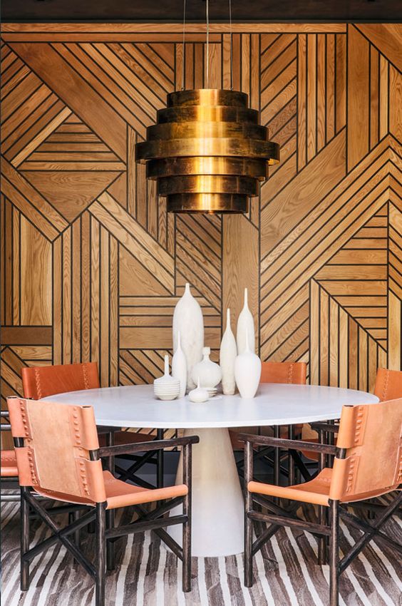 Art Deco wall covering with modern table and light fixture